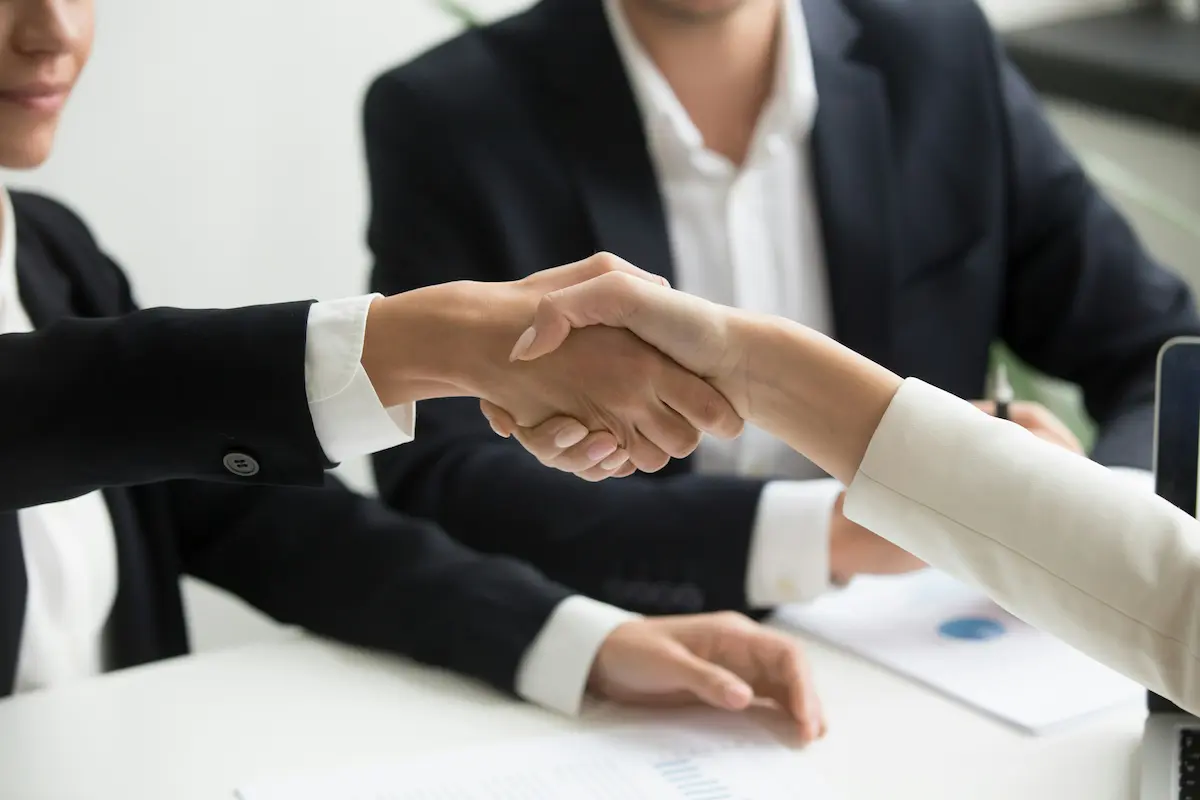 Business handshake in a meeting